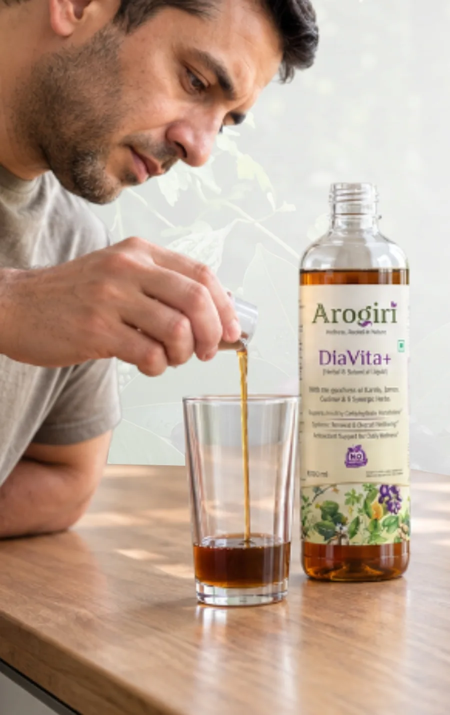 Pouring a 20 ml serving of DiaVita+ into a glass